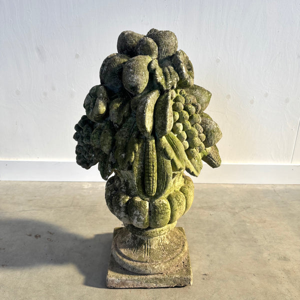 Ancient concrete potpourri of flowers and fruit