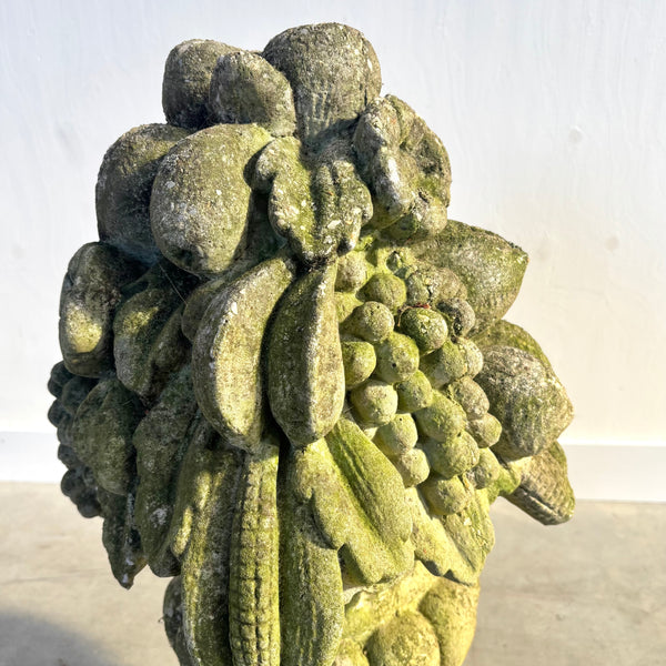 Ancient concrete potpourri of flowers and fruit