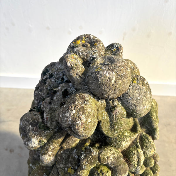 Ancient concrete potpourri of flowers and fruit