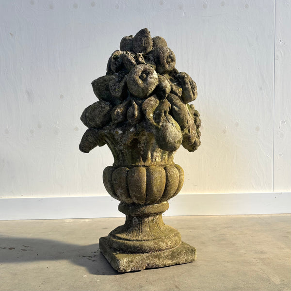 Ancient concrete potpourri of flowers and fruit