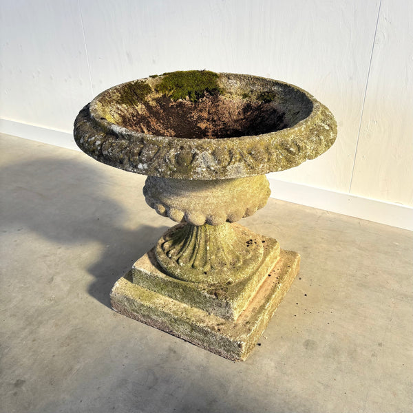 Ancient concrete plant stand