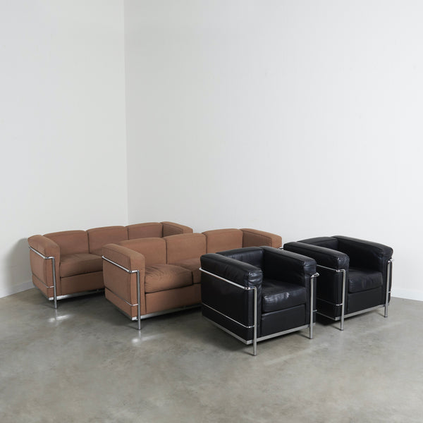 2x Cassina LC2 sofa by Le Corbusier & Charlotte Perriand