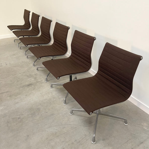 Six Herman Miller low back chairs, model EA105
