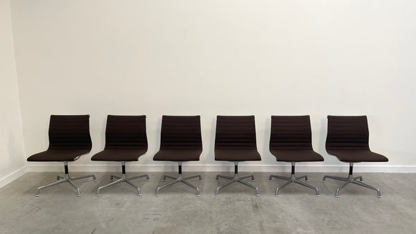 Six Herman Miller low back chairs, model EA105