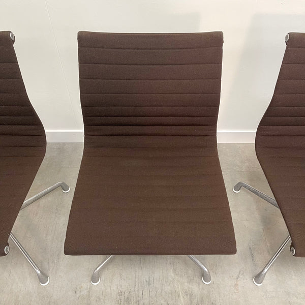 Six Herman Miller low back chairs, model EA105