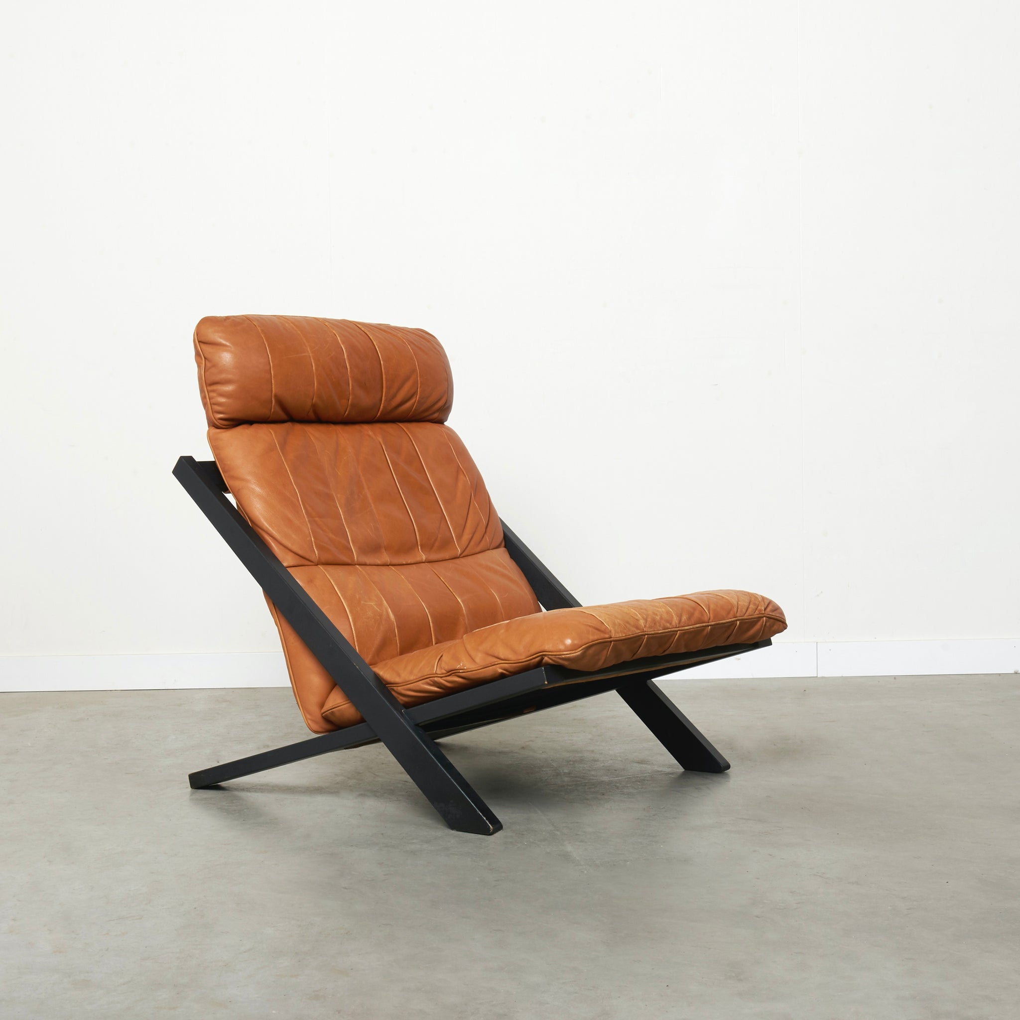 Cognac leather lounge chair by Ueli Berger, De Sede DS80