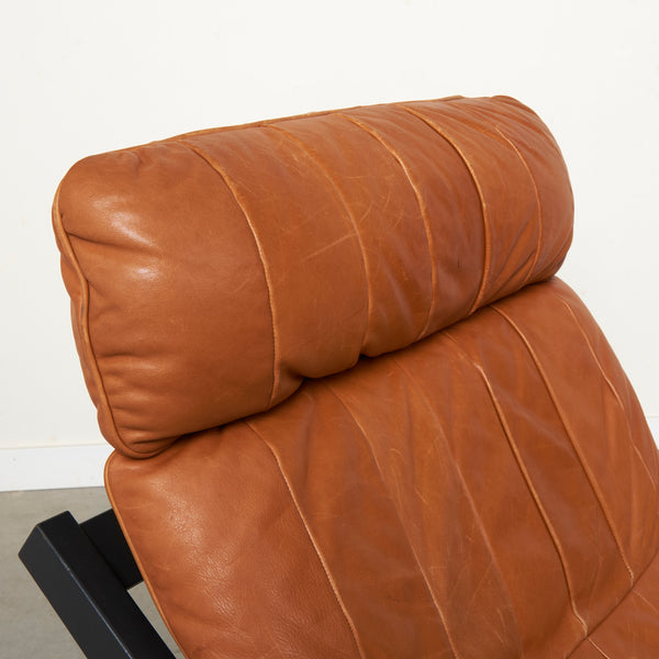 Cognac leather lounge chair by Ueli Berger, De Sede DS80