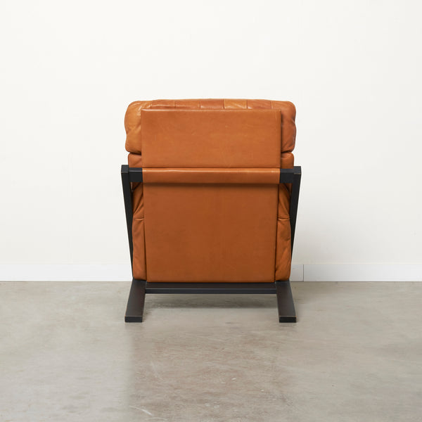 Cognac leather lounge chair by Ueli Berger, De Sede DS80