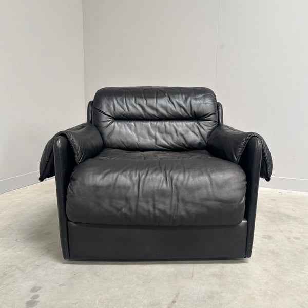 Black leather lounge chair by Dreipunkt, 1970s