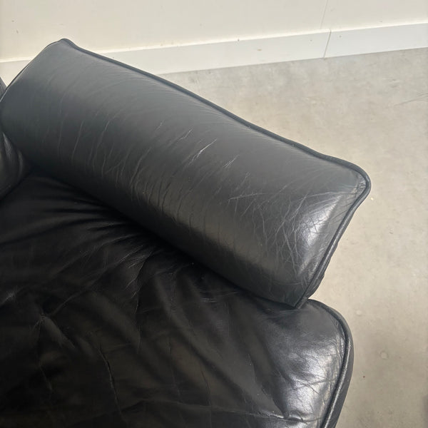 Black leather De Sede lounge hair with hocker, DS31
