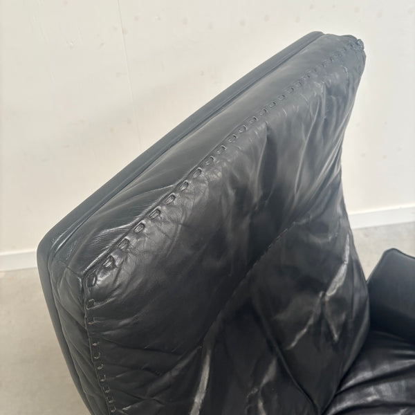 Black leather De Sede lounge hair with hocker, DS31