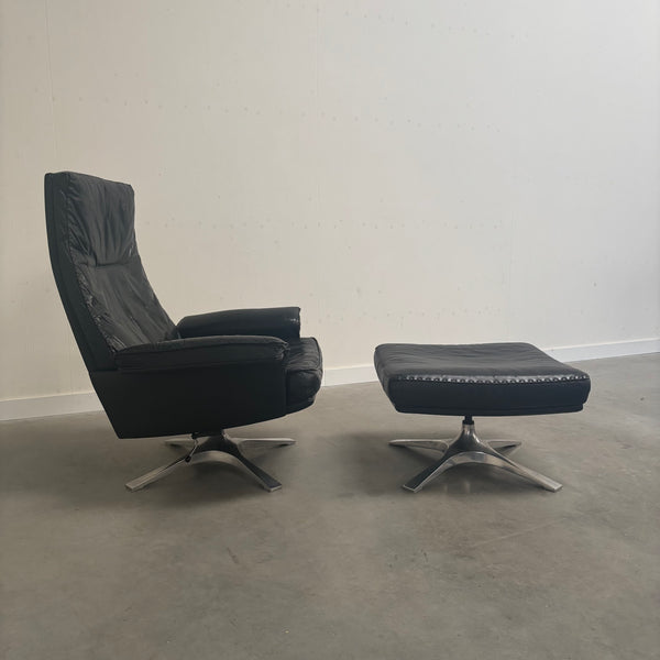 Black leather De Sede lounge hair with hocker, DS31