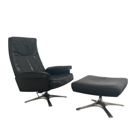 Black leather De Sede lounge hair with hocker, DS31