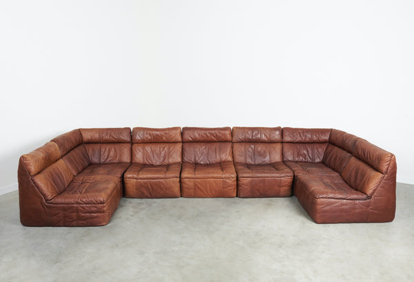 Vintage leather lounge sofa by Rolf Benz, 1970s