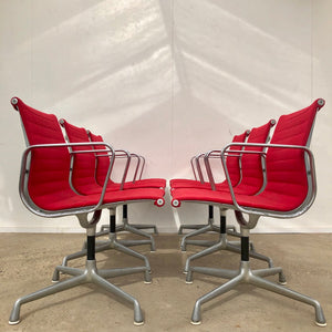 Set Herman Miller low back side chairs by Charles & Ray Eames, model EA107