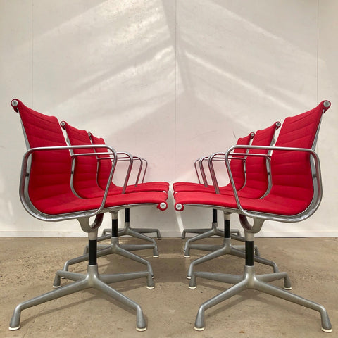 Set Herman Miller low back side chairs by Charles & Ray Eames, model EA107