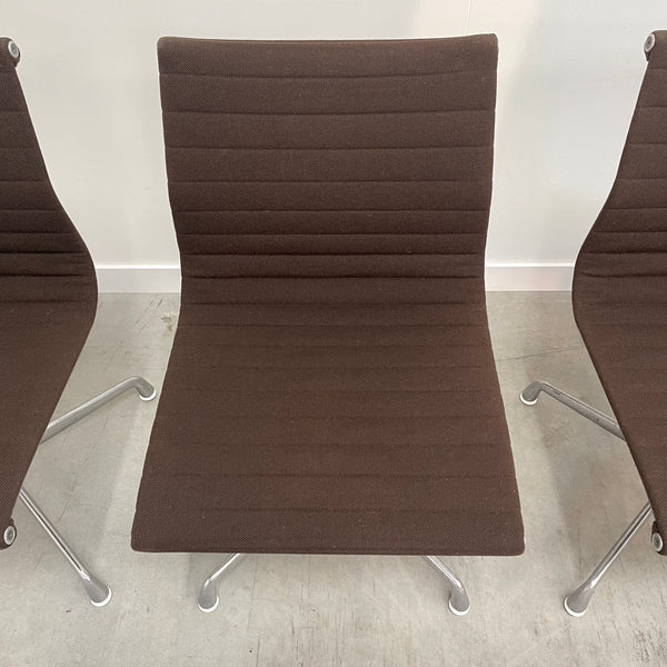 Six Herman Miller low back chairs, model EA105